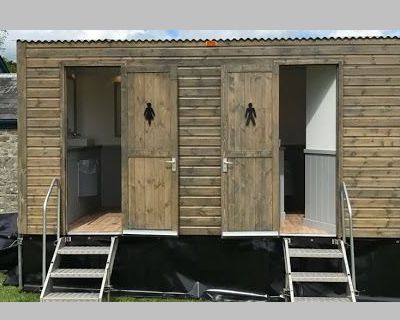 Wooden hire toilet cabin
